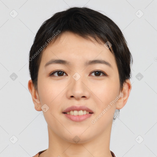 Joyful asian young-adult female with short  brown hair and brown eyes