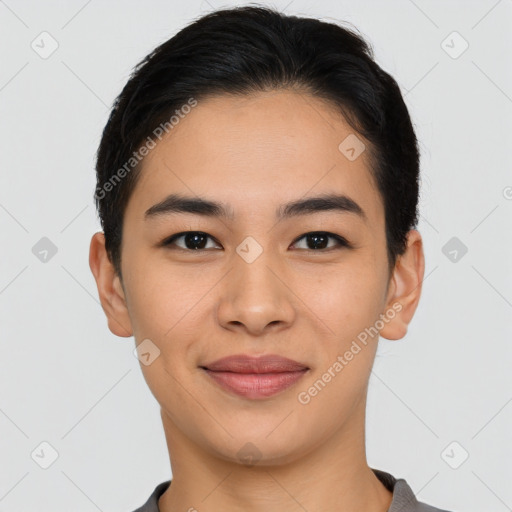 Joyful asian young-adult female with short  brown hair and brown eyes