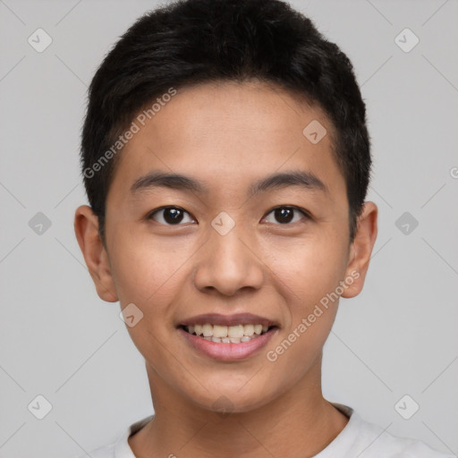 Joyful asian young-adult male with short  black hair and brown eyes