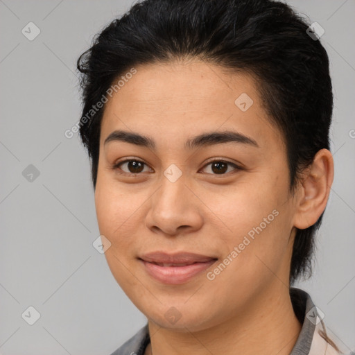 Joyful asian young-adult female with short  brown hair and brown eyes