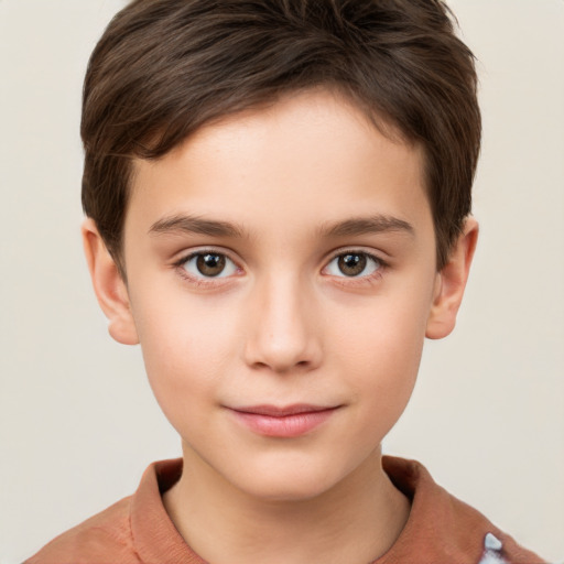 Joyful white child male with short  brown hair and brown eyes