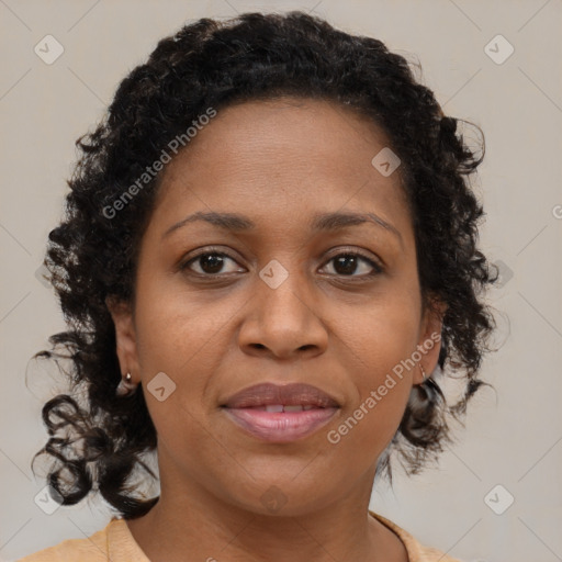 Joyful black young-adult female with medium  brown hair and brown eyes