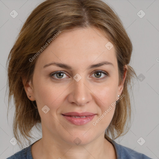 Joyful white young-adult female with medium  brown hair and blue eyes