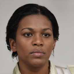 Neutral black young-adult female with short  brown hair and brown eyes