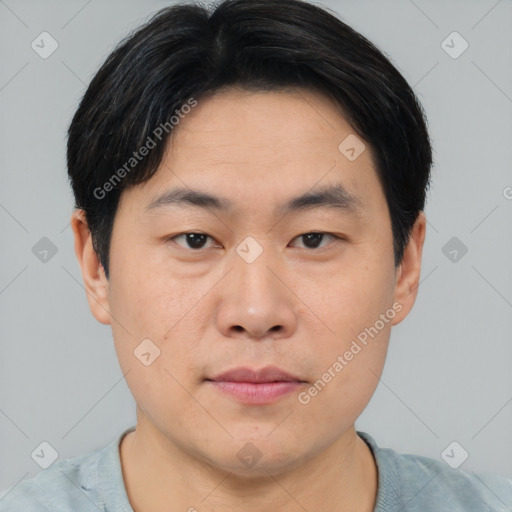 Neutral asian young-adult male with short  brown hair and brown eyes