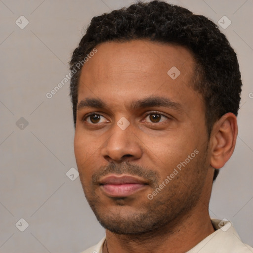 Neutral latino young-adult male with short  black hair and brown eyes
