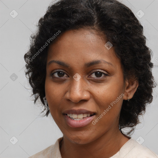 Joyful black young-adult female with long  brown hair and brown eyes