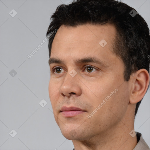 Neutral white adult male with short  black hair and brown eyes