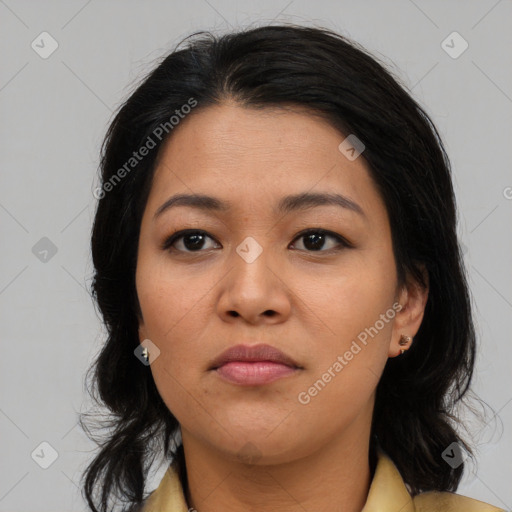 Joyful asian young-adult female with medium  black hair and brown eyes