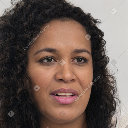 Joyful latino young-adult female with long  brown hair and brown eyes