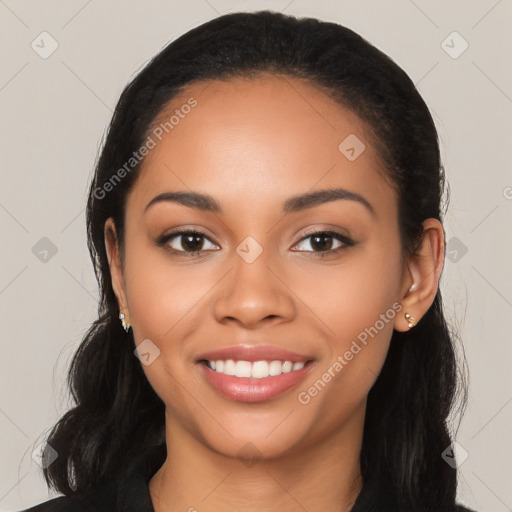 Joyful latino young-adult female with long  black hair and brown eyes