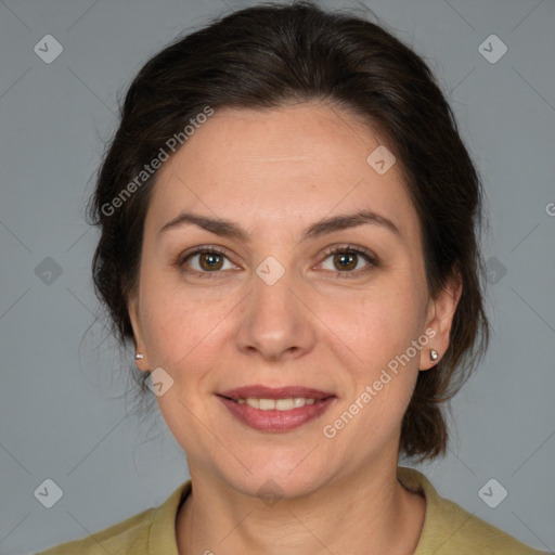 Joyful white adult female with medium  brown hair and brown eyes