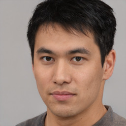 Neutral asian young-adult male with short  black hair and brown eyes