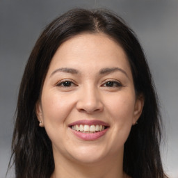 Joyful white young-adult female with medium  brown hair and brown eyes