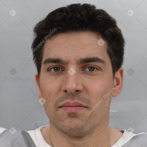 Neutral white adult male with short  brown hair and brown eyes