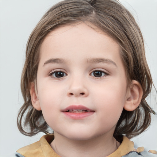 Joyful white child female with medium  brown hair and grey eyes