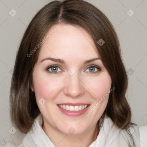 Joyful white young-adult female with medium  brown hair and green eyes