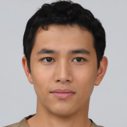 Neutral asian young-adult male with short  black hair and brown eyes