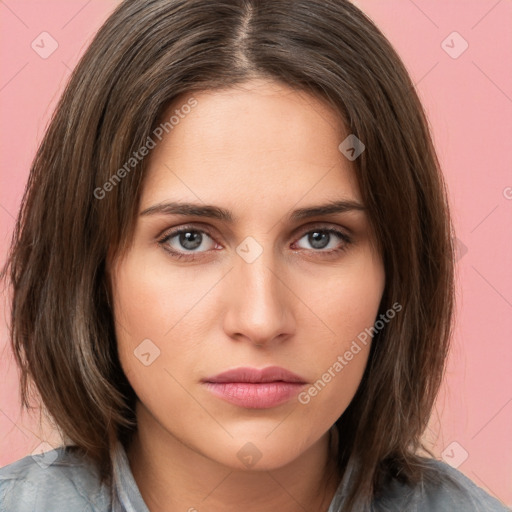 Neutral white young-adult female with medium  brown hair and brown eyes