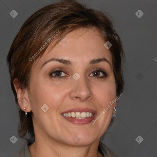 Joyful white adult female with medium  brown hair and brown eyes