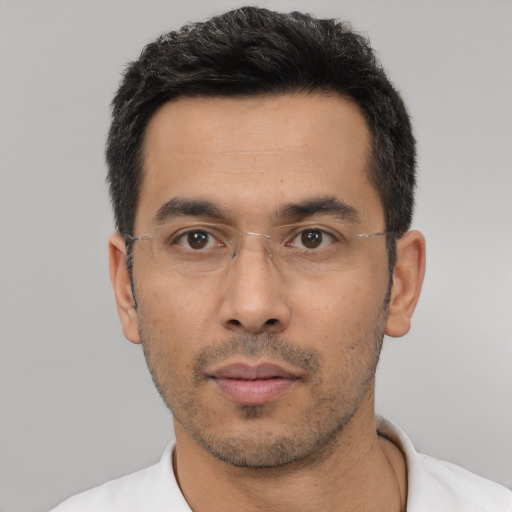 Neutral asian adult male with short  black hair and brown eyes