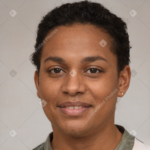 Joyful black young-adult female with short  brown hair and brown eyes