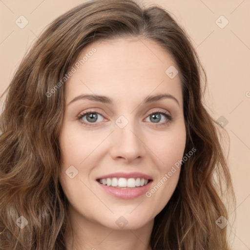 Joyful white young-adult female with long  brown hair and green eyes