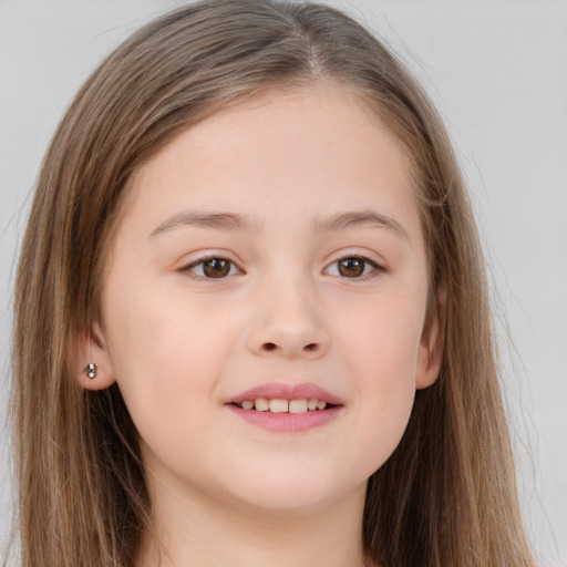 Joyful white child female with long  brown hair and brown eyes