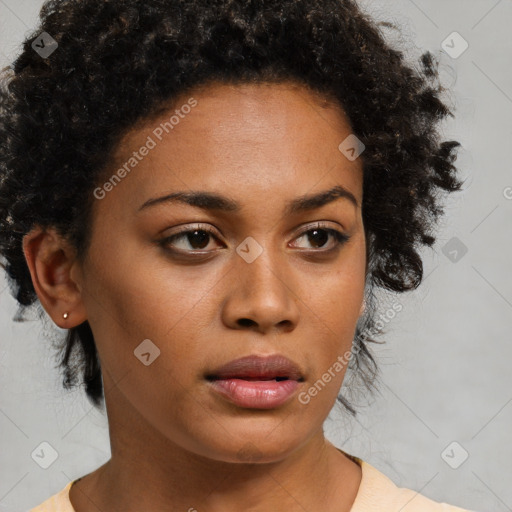 Neutral black young-adult female with medium  brown hair and brown eyes