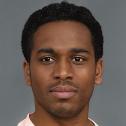 Neutral black young-adult male with short  brown hair and brown eyes