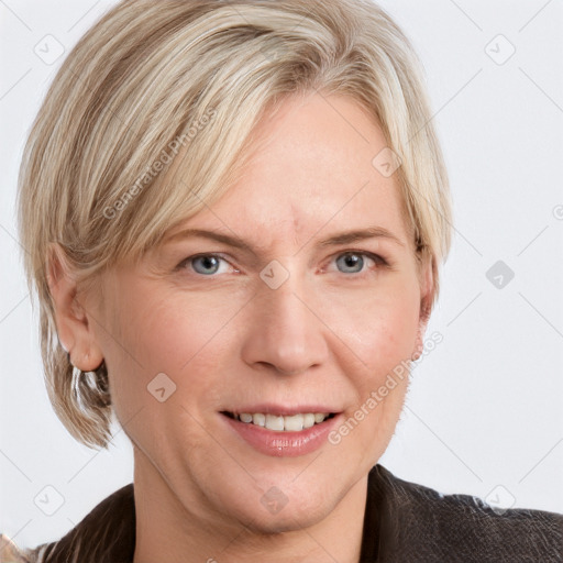 Joyful white adult female with medium  brown hair and blue eyes