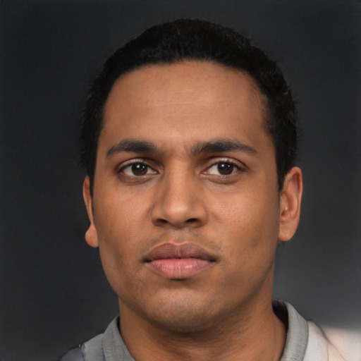 Neutral latino young-adult male with short  black hair and brown eyes
