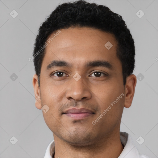 Neutral latino young-adult male with short  black hair and brown eyes