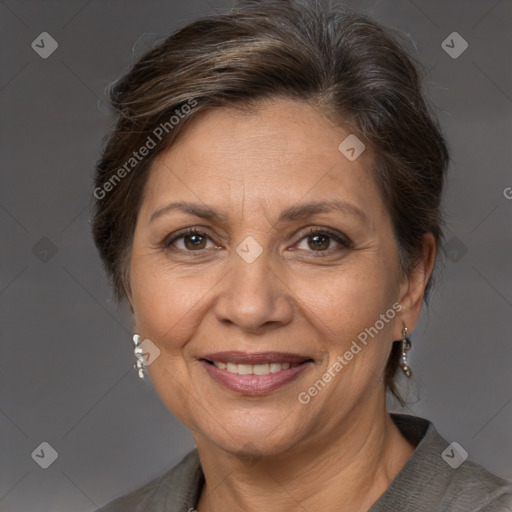 Joyful white adult female with short  brown hair and brown eyes