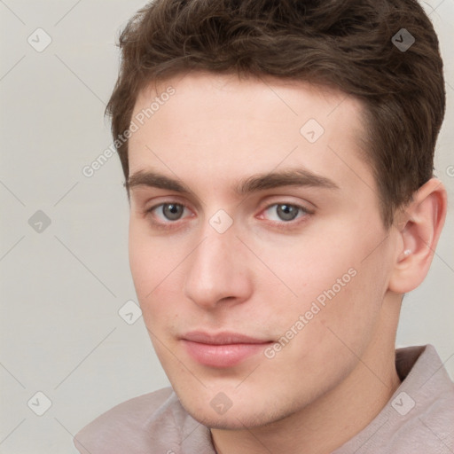 Neutral white young-adult male with short  brown hair and grey eyes