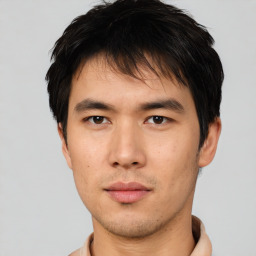 Neutral asian young-adult male with short  brown hair and brown eyes