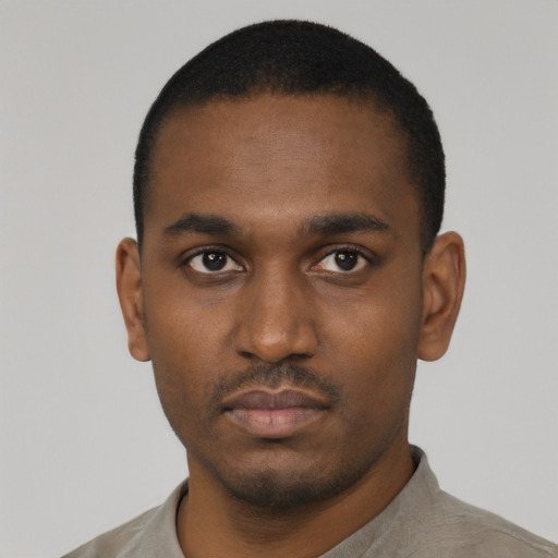 Neutral black young-adult male with short  black hair and brown eyes