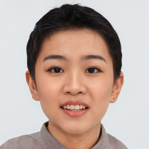 Joyful asian young-adult female with short  black hair and brown eyes
