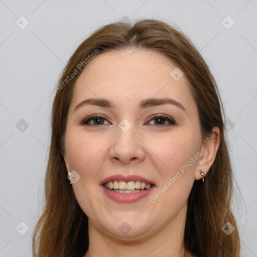 Joyful white young-adult female with long  brown hair and brown eyes