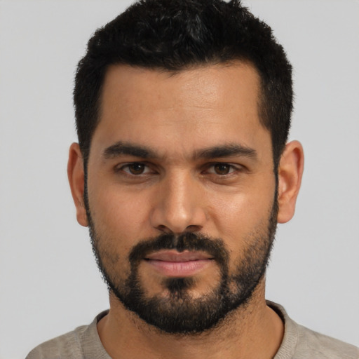 Neutral latino young-adult male with short  black hair and brown eyes