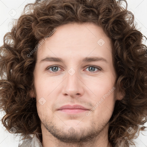 Joyful white young-adult male with medium  brown hair and brown eyes