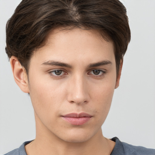 Neutral white young-adult female with short  brown hair and brown eyes