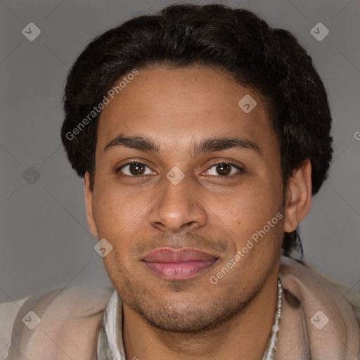 Joyful black adult male with short  brown hair and brown eyes