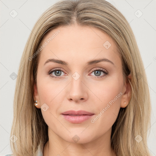 Joyful white young-adult female with long  brown hair and grey eyes