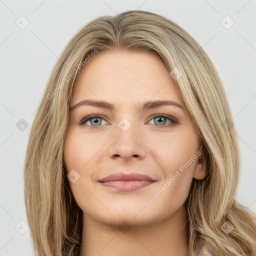 Joyful white young-adult female with long  brown hair and green eyes