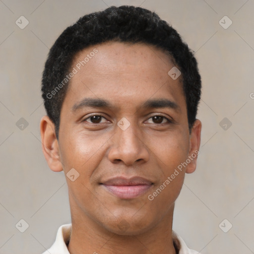 Joyful black young-adult male with short  black hair and brown eyes