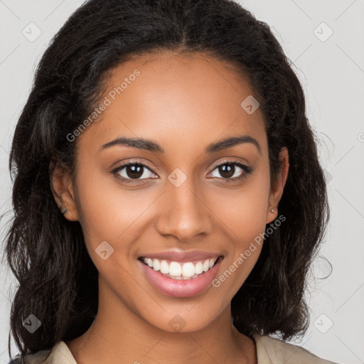 Joyful latino young-adult female with long  brown hair and brown eyes