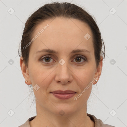 Joyful white adult female with short  brown hair and brown eyes