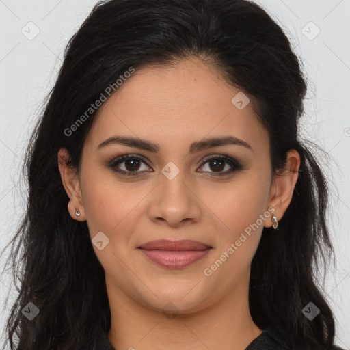 Joyful latino young-adult female with long  brown hair and brown eyes