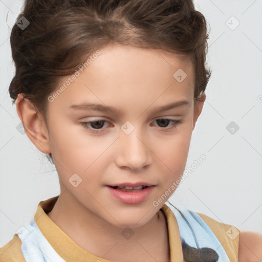 Joyful white child female with short  brown hair and brown eyes